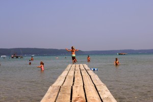 Girl jumps off pier at Crystal Lake